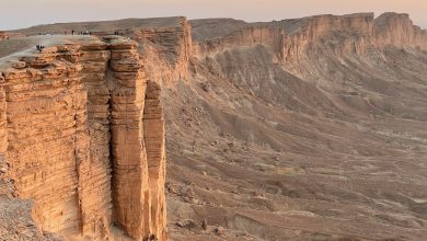 brown rock formation under white sky during daytime